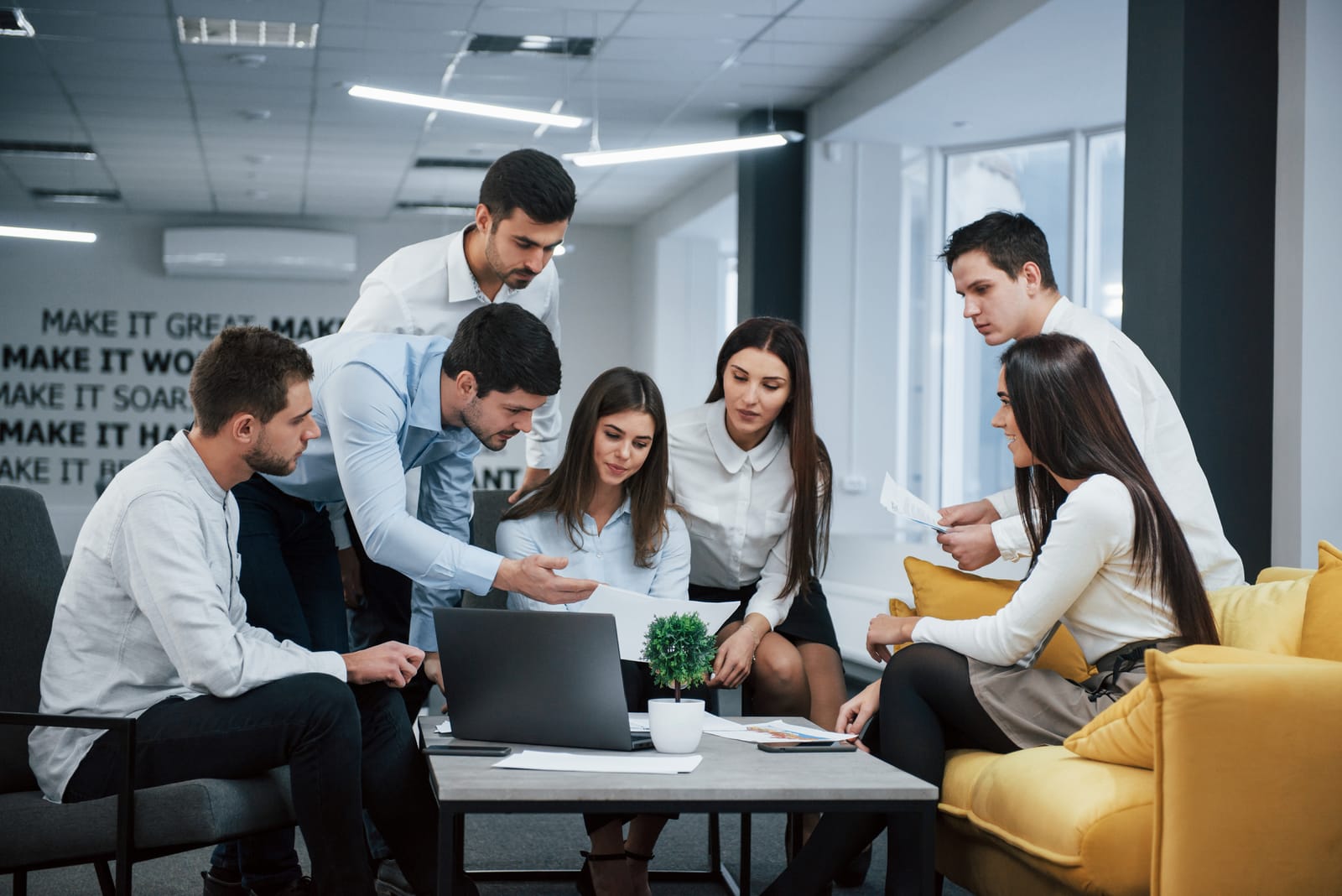 Advisor walking a client team through a written assessment.